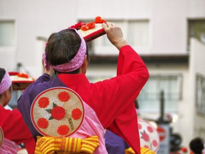Dressed up man during Hanagasa festival in Yamagata city, Japan