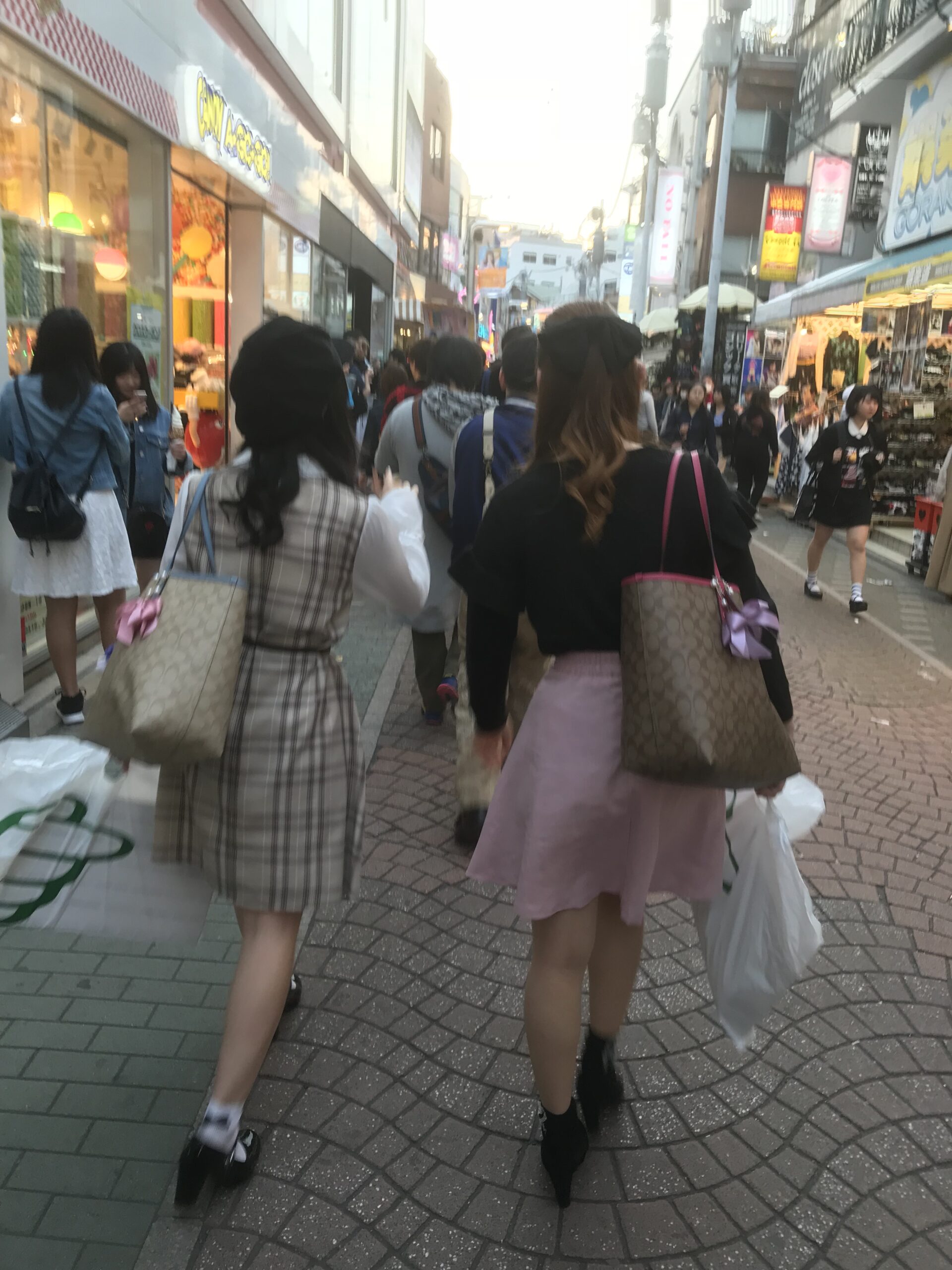 Young girls shopping in Takeshita street in Harajuku, Tokyo, Japan