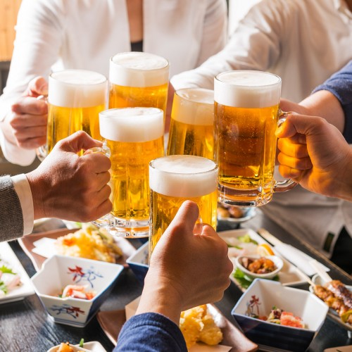 Office workers make a toast after work in Japan
