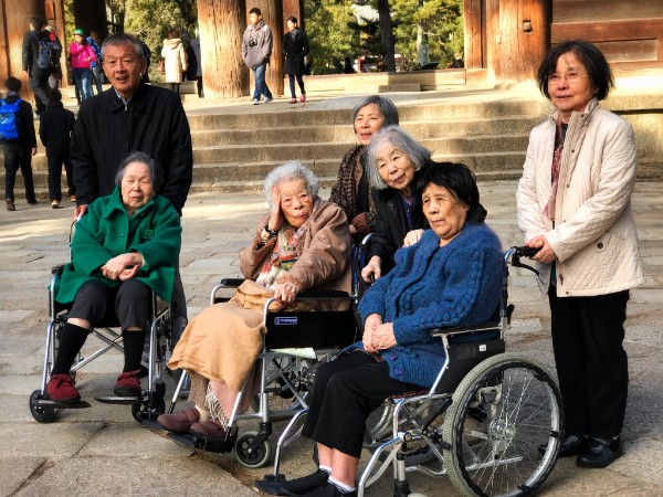 Senior citizens in a wheelchair who live in super ageing society Japan.