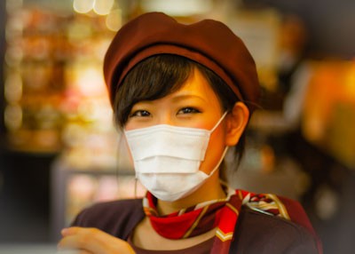 Japanese woman wearing a surgical mask in Japan