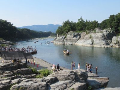 People playing in the river in Nagatoro, Japan