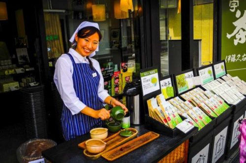 woman selling green tea in uji japan
