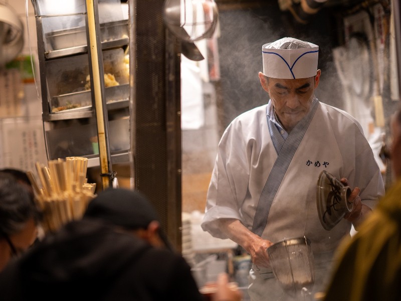 Chef cooking street food in Japan