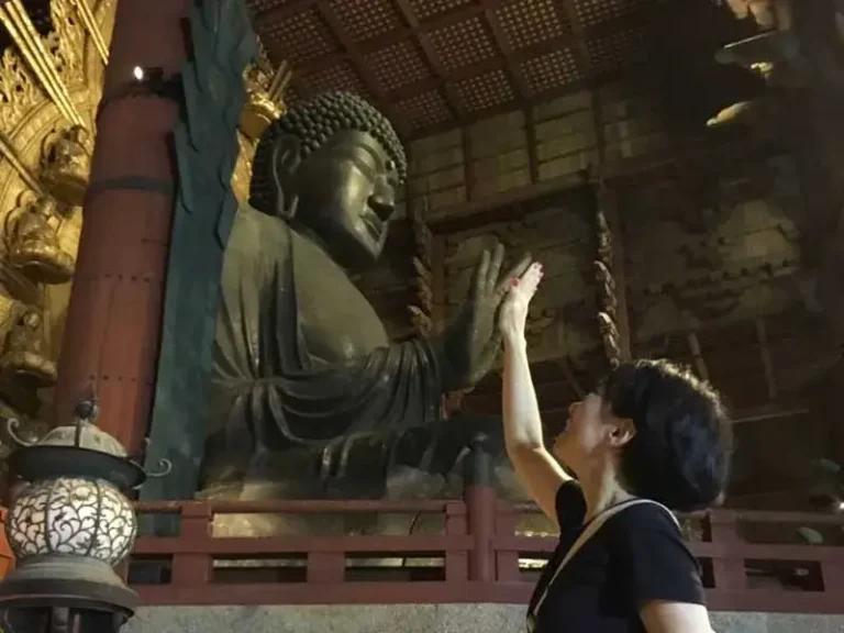 Child visiting Todaiji Temple, one of Japan's most important Buddhist temples