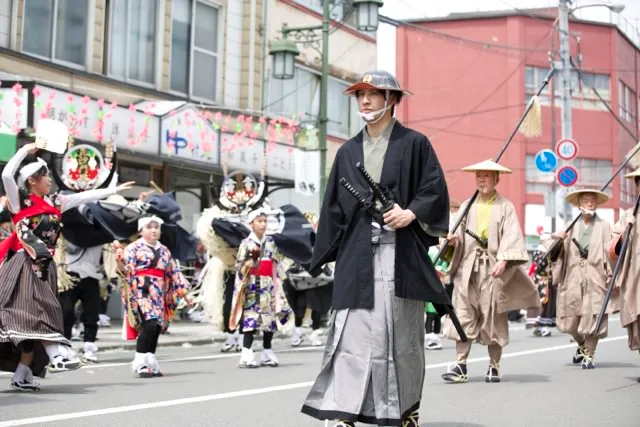 A man dressed as a samurai in a parade in Tono, Japan